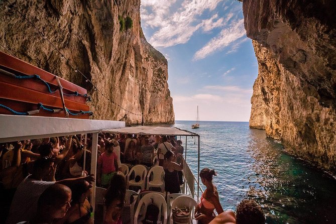 Paxos Antipaxos Blue Caves Cruise from Corfu - On-board pace, dolphins, music, and the vibe for a 10-hour day