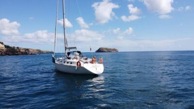 Ponta Delgada: Private Sailboat Cruise with Drinks & Snacks - Sailing at the helm: learning without turning it into a class