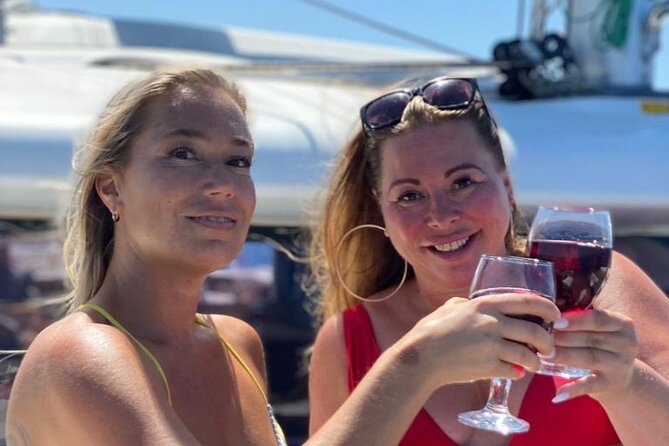 Private 4 hour Catamaran cruise in south coast of Gran Canaria - Anchor time: swimming, snorkeling, and paddleboarding in clear water