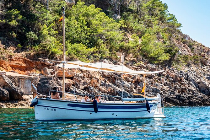 Private 4-hour Mediterranean Boat Tour in Ibiza with Snorkeling - Stop 1: Cala Comte for snorkeling, swimming breaks, and sunset time