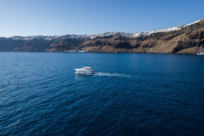 Private all included yacht Tour in Santorini - Oia sightseeing under the village, finishing at Ammoudi Bay