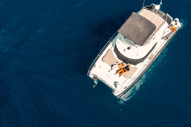 Private Caldera Cruise with Power Catamaran ENJOY incl. Meal & Drinks - From Oia to the Caldera: what the ENJOY power catamaran experience feels like