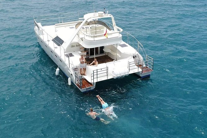Private Catamaran Charter with Transfer, Buffet and Snorkeling - Lunch, snacks, and drinks: the onboard buffet vibe