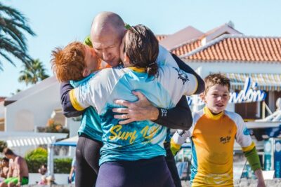 Private Family Surf Lesson - Where You Start: Playa de la Américas and the 100-Meter Shop