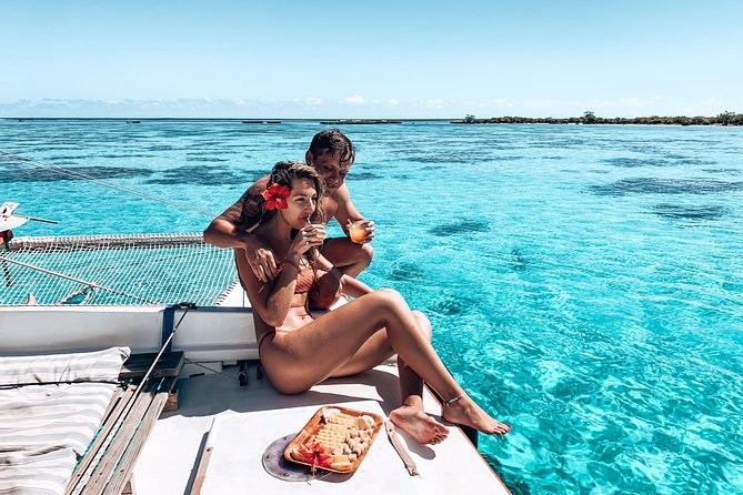PRIVATE Half Day Tour : Moorea Snorkeling & Sailing on a Catamaran named Taboo - Snacks, drinks, and the crew rhythm on board