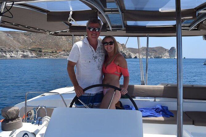 Private Luxury Santorini Catamaran Cruise with Port Pickup - Palea Kameni warm springs: where the water feels like a bath