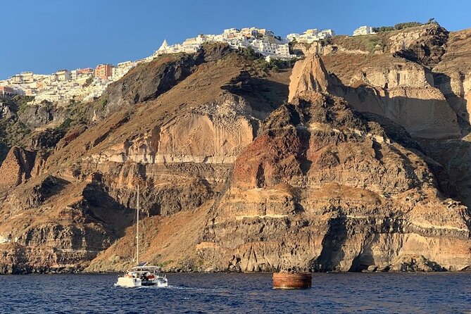 Private Luxury Santorini Catamaran Cruise with Port Pickup - Unlimited soda, limited wine/beer, and what to do about it