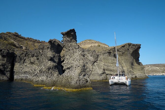 Private Luxury Santorini Catamaran Cruise with Port Pickup - On-board comfort: bathrooms, towels, masks, and a crew that stays on it