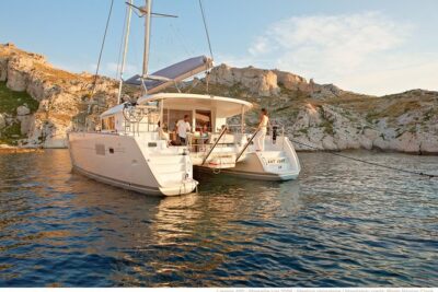 Private Morning Tour Lagoon 400-380 Sailing in Santorini ,lunch, drink, transfer - Photo Windows While You Cruise: Aspronissi, Lighthouse Views, and Rock Formations