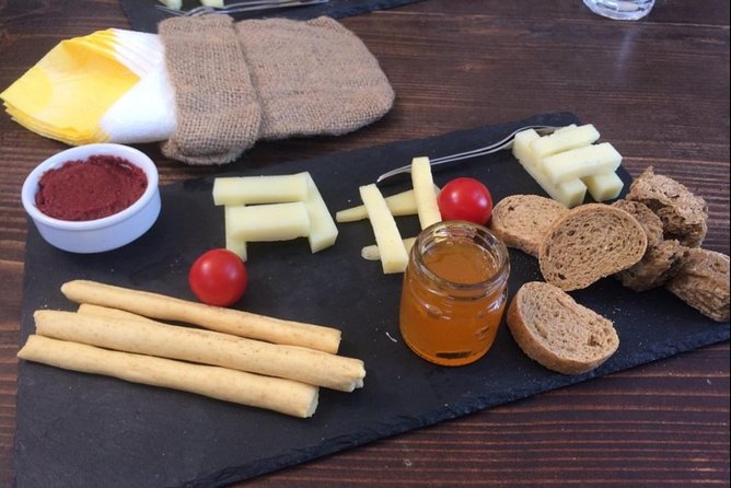 Private Santorini Cooking Class & Wine Tasting Tour - Who should book this Santorini wine and cooking tour