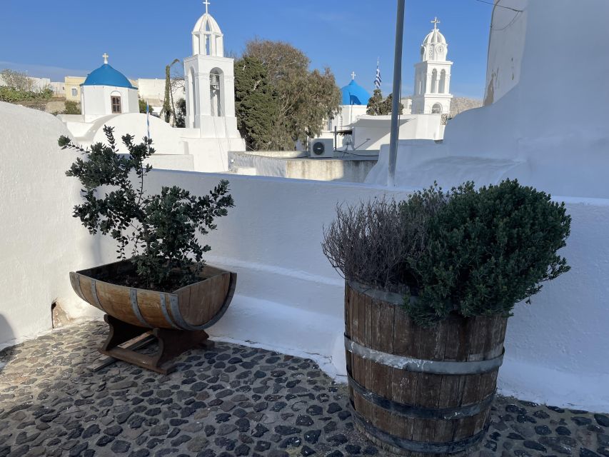 Private Wine Tasting Tour With a Santorini Sunset Ending - Getting picked up on steep Santorini streets