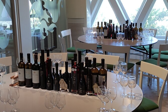 Private Wine Tour in 3 Wineries with 12 Wine Tastings and Tapas - Venetsanos Winery on the Caldera: Gravity-Fed Production and Sunset Views