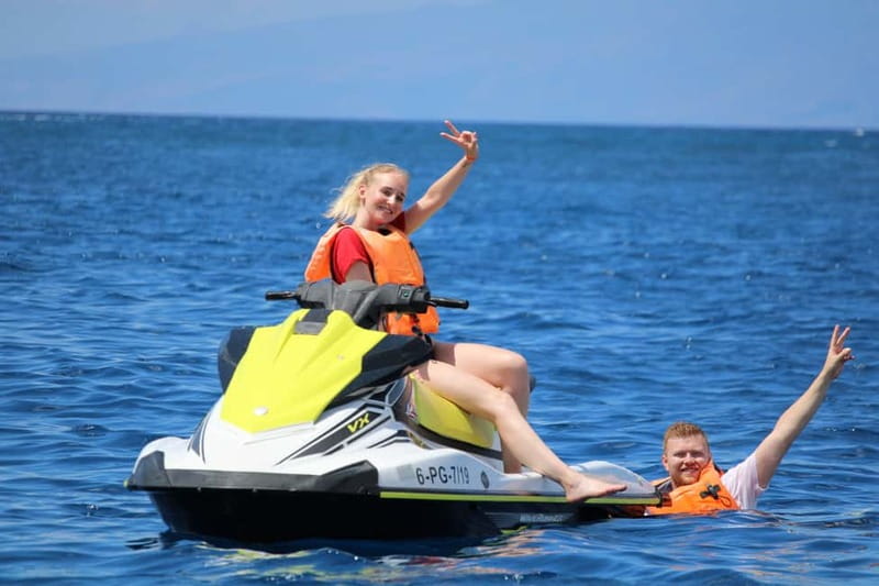 Puerto Colón: Tenerife Coast Jet Ski Tour with Photos - Costa Adeje Jetskiing: Where the Adrenaline Lives