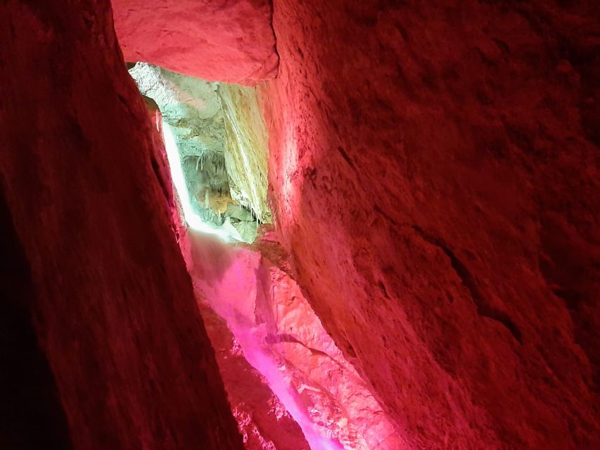 Puerto de San Miguel: Can Marçá Cave Guided Tour with Entry - Lights, sounds, and water effects: why they’re included