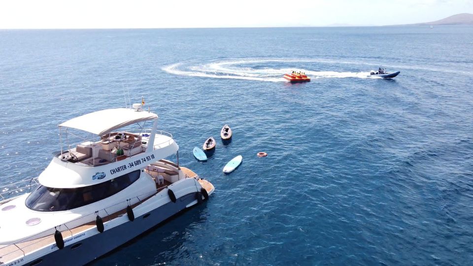 Puerto del Carmen: Catamaran Trip with Water Sports - How the on-board food and drinks change the vibe