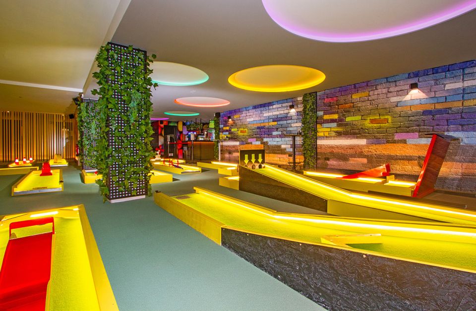 Puerto del Carmen: Indoor 18 hole Crazy Mini Golf Experience - The 18 holes: twists, turns, and UV neon fun with sea views