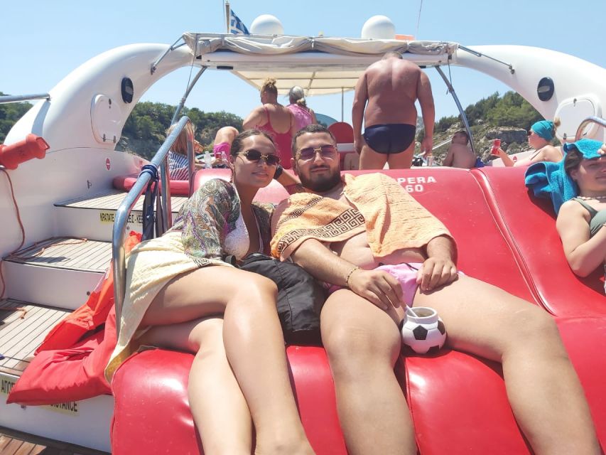 Rhodes: Beach Cruise with Swimming, Meal, & Unlimited Drinks - Traganou Caves: guided cave time and why water shoes help