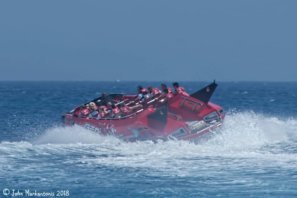 Rhodes: Beaches Trip by Jet Boat with Snorkeling and Drinks - Kallithea Springs Bay: snorkeling gear and sea cave scenery