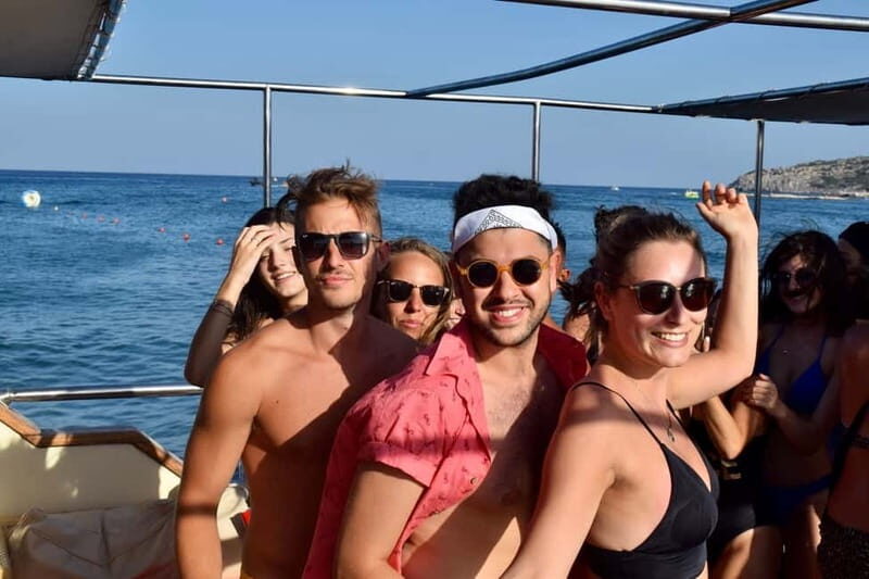Rhodes: Boat Party Cruise with Live DJ - Anthony Quinn Bay swim stop and the champagne plunge game
