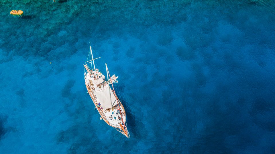 Rhodes: Cruise with 3 Stops, Lunch and Unlimited Drinks - Anthony Quinn Bay swim stop: emerald water and a real snorkel window