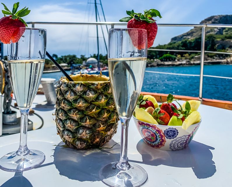 Rhodes: Cruise with 3 Stops, Lunch and Unlimited Drinks - Kallithea Springs: rocks, ladders, and clear-water snorkeling