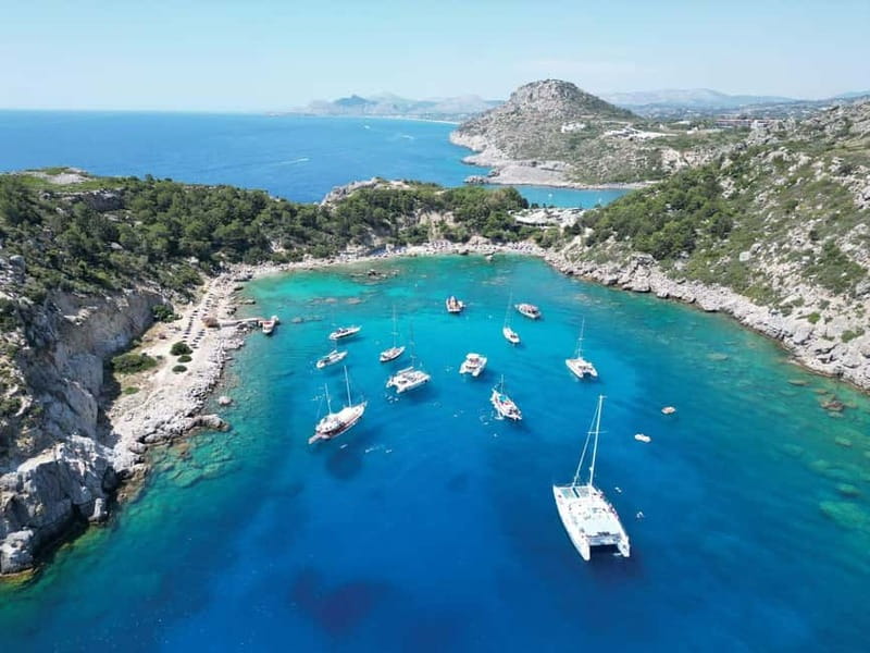 Rhodes: Cruise with 4 Swim Stops, Lunch, Drinks & Transfers - Boat Comfort and the Open Bar That Keeps the Mood Light