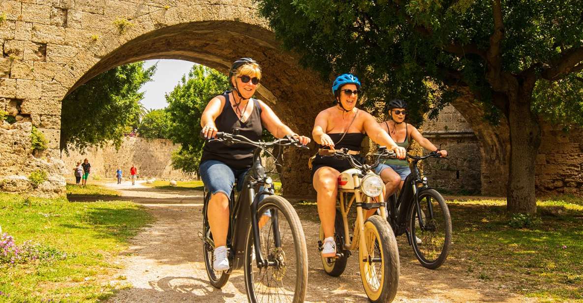 Rhodes: E-bike Highlights Sunset or Morning Photo Tour - Mandraki Port and the Old Town maze: squares, knights, and a Clock Tower view