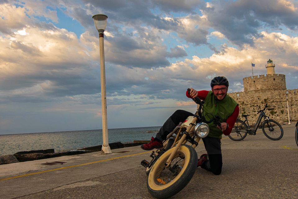 Rhodes: E-bike Highlights Sunset or Morning Photo Tour - Palace of the Grand Master, Mandraki Harbour, and Colossus photo moments