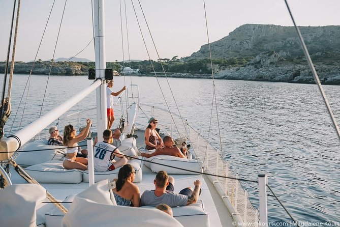 Rhodes Exclusive Sunset tour Cocktail Open bar Gourmet Live Music - Is this a romantic dinner cruise or a party cruise?