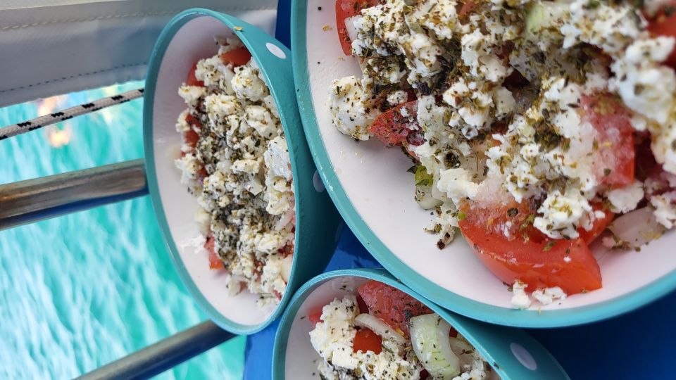 Rhodes: Fishing Trip, Snorkelling, BBQ, & Professional Guide - The Lunch Moment: Fresh BBQ Fish and Greek Salad Done the Local Way