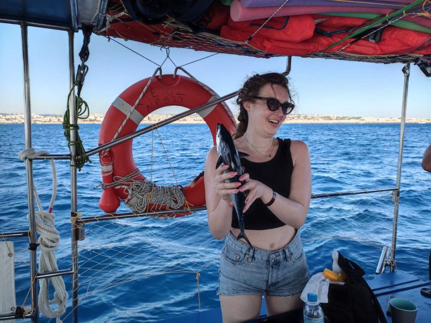 Rhodes: Fishing Trip, Snorkelling, BBQ, & Professional Guide - Snorkelling and Swimming in a Quiet Bay