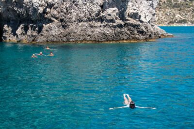 Rhodes: Full Day East Coast Bay to Bay Boat Trip with Lunch - Getting to Mandraki Port: Where You Meet and What to Bring