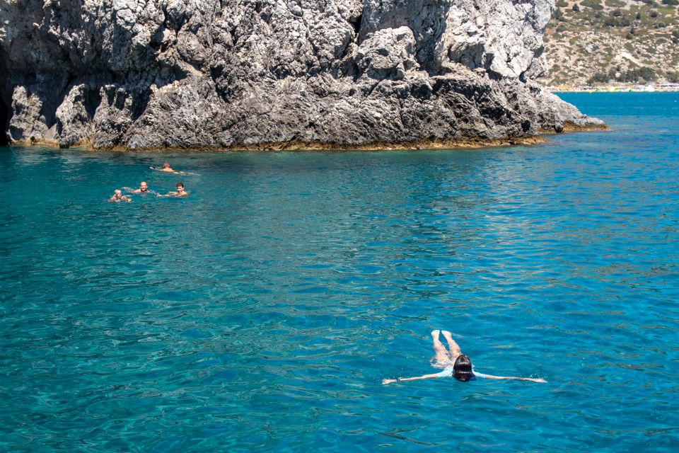 Rhodes: Full Day East Coast Bay to Bay Boat Trip with Lunch - Getting to Mandraki Port: Where You Meet and What to Bring