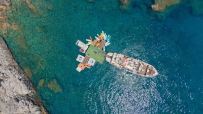 Rhodes: Gulet Trip with Food, Drinks, SUP, Kayak & Swimming - Mandraki Meeting Point: Find the El Greco and Beat the Shade