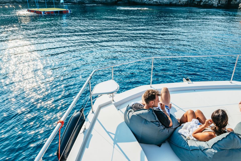 Rhodes: Sunset Catamaran Cruise with Dinner Buffet & Drinks - Kalithea Bay at Anchor: Swimming, Snorkeling Gear, and That Open-Water Feeling