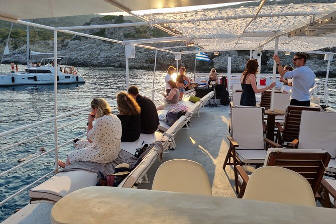 Rhodes Sunset Cruise - Swim and Dine w/ Live Music & Sunset! - Comfort and what to pack (especially for wind)