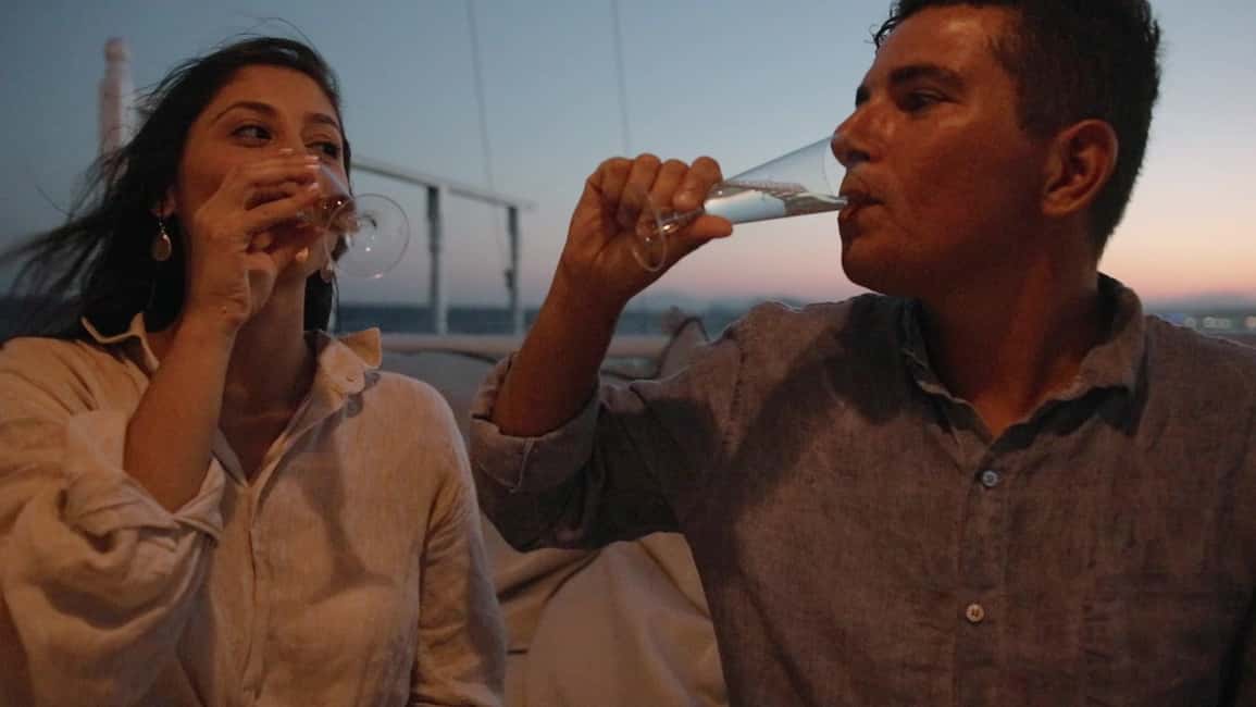 Rhodes: Sunset Cruise w/ Gourmet Buffet, Drinks & Live Music - Sunset mid-sea: the captain times the moment (and the boat signals it)