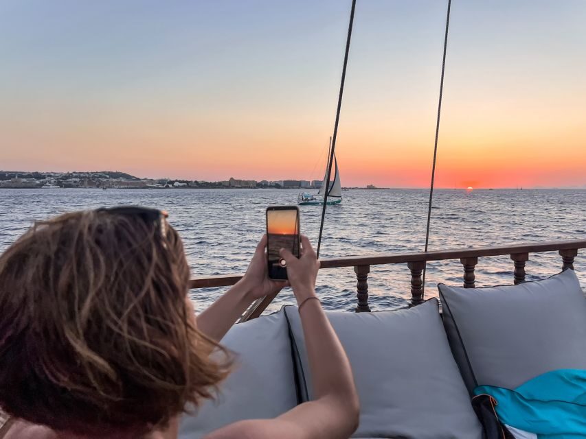 Rhodes: Sunset Cruise with Greek BBQ and Unlimited Drinks - Watching Rhodes Town sunset without rushing