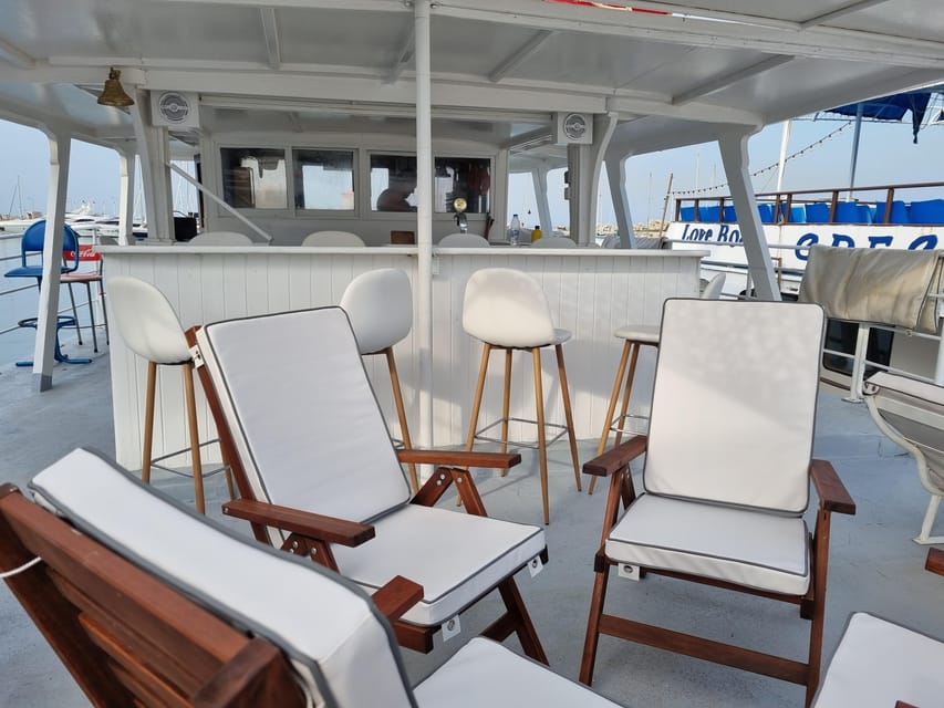 Rhodes: Sunset Cruise with Live Music, Wine & Greek Buffet - Kalithea Springs stop: the swim part people remember