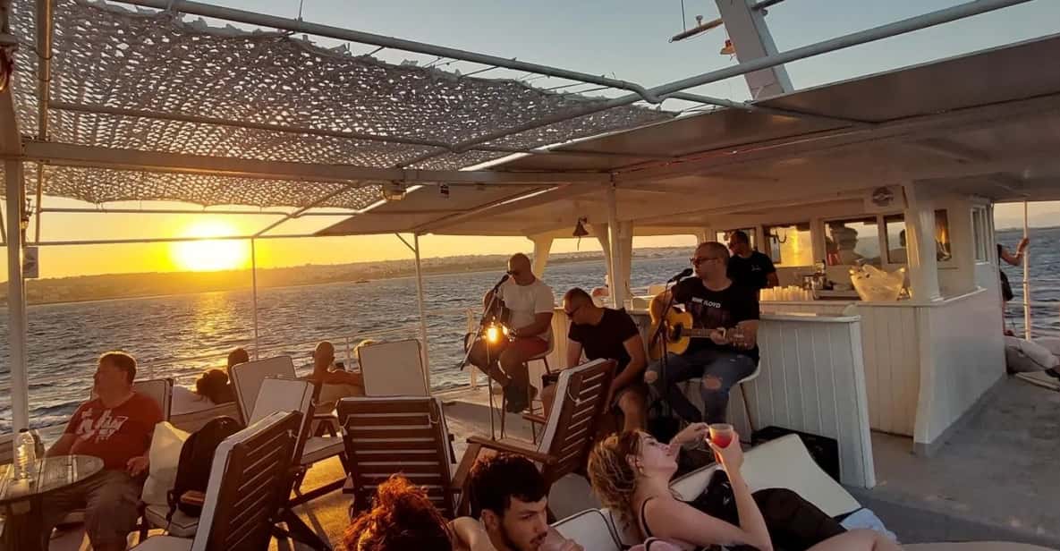 Rhodes: Sunset Cruise with Live Music, Wine & Greek Buffet - Getting back to Mandraki: smooth wrap-up, not a rush job