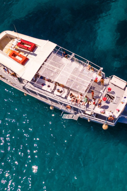 Rhodes: Sunset Cruise with Live Music, Wine & Greek Buffet - Pricing and value: why $53 can make sense