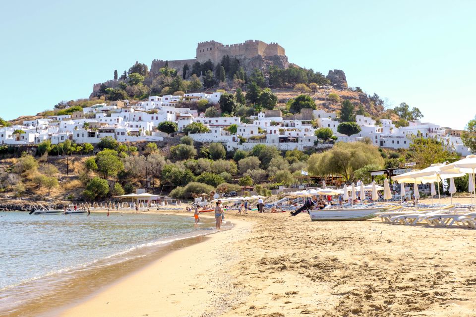 Rhodes Town: Scenic Cruise to Lindos with Swim Stops - Sailing the East Coast: Deer Statues, Lighthouses, and Resort Shorelines