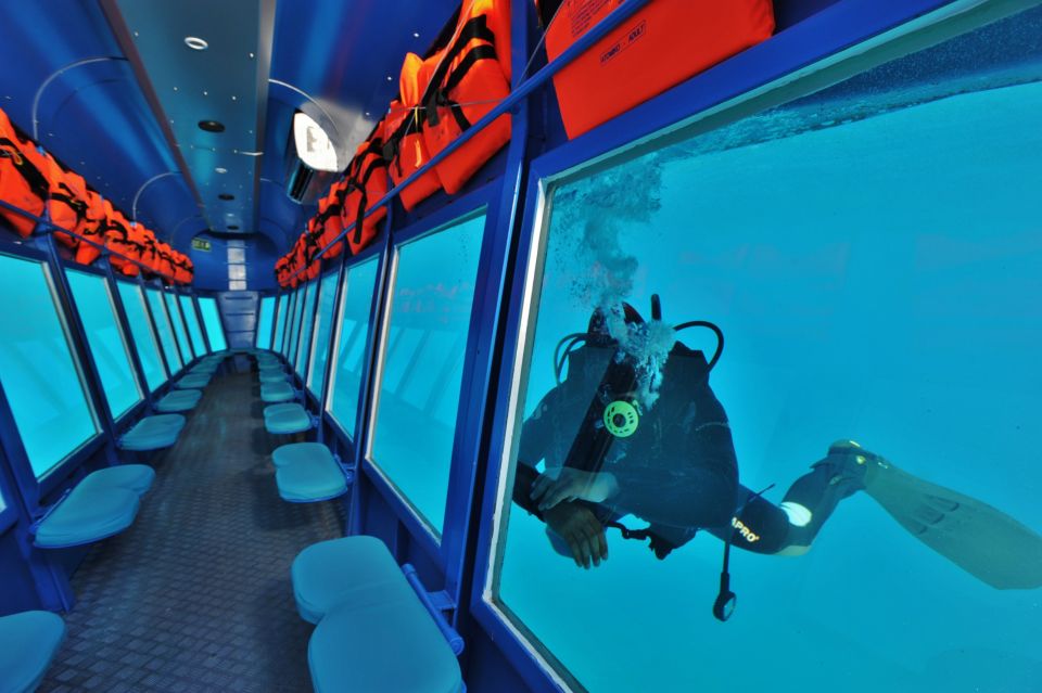 Rhodes Town: Yellow Submarine Cruise with Underwater Views - The Scuba Diver Feeding Show: The Moment That Makes It Feel Special