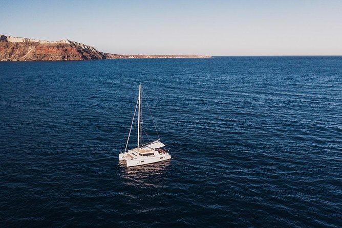 Romantic Sunset Catamaran Caldera Cruise incl. Meal & Drinks - Greek BBQ and the Open Bar: What’s Included (and What Isn’t)