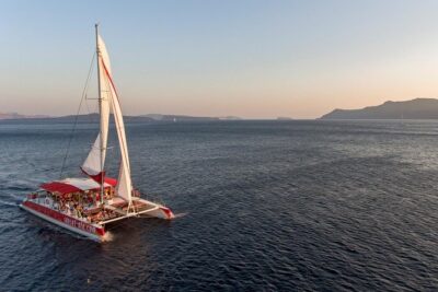 Sailing Catamaran Cruise in Santorini with BBQ, Drinks and Transfer - Sailing past the volcano: what you’ll notice along the way