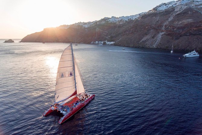 Sailing Catamaran Cruise in Santorini with BBQ, Drinks and Transfer - What makes the cruise good value at about $95.53