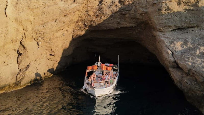 San Antonio: Cala Bassa, Cala Conta and Cave Boat Trip - Cala Conta: walking, snorkeling, and paddle surf with included gear