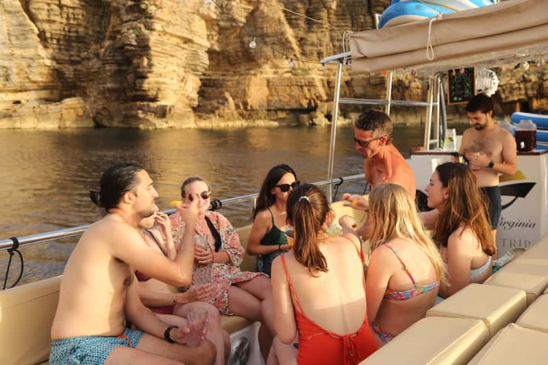 San Antonio: Cala Salada & Cala Gracio Sunset Boat Trip - Sunset at Cafe del Mar and Mambo Bay: What to Expect in the Golden Hour