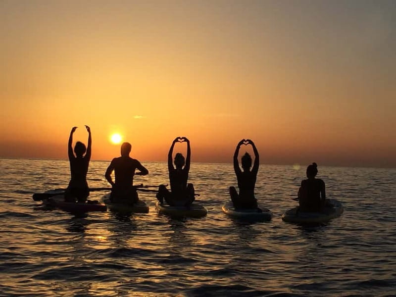 San Antonio: Cala Salada & Cala Gracio Sunset Boat Trip - Your Floating Base: Boat, Gear, and Food and Drink