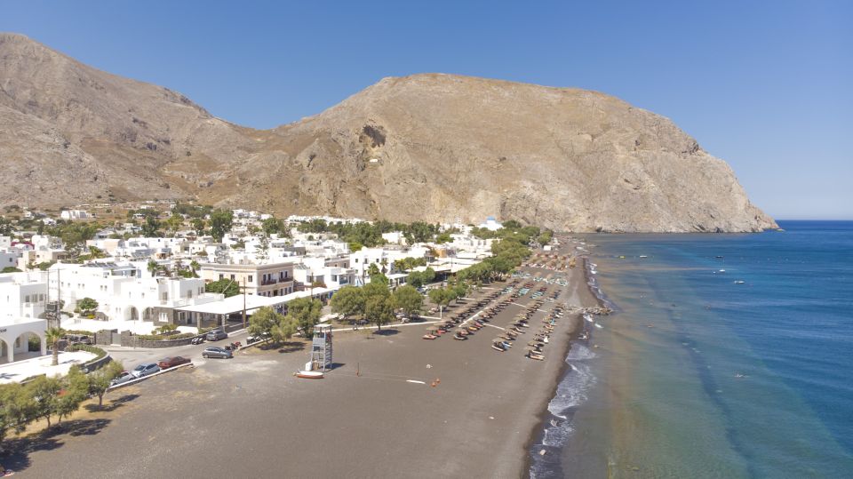 Santorini 2-Day Combo: Volcano Boat Cruise & Island Bus Tour - Bus day from Akrotiri to Perissa: villages, beach time, and a wine tasting